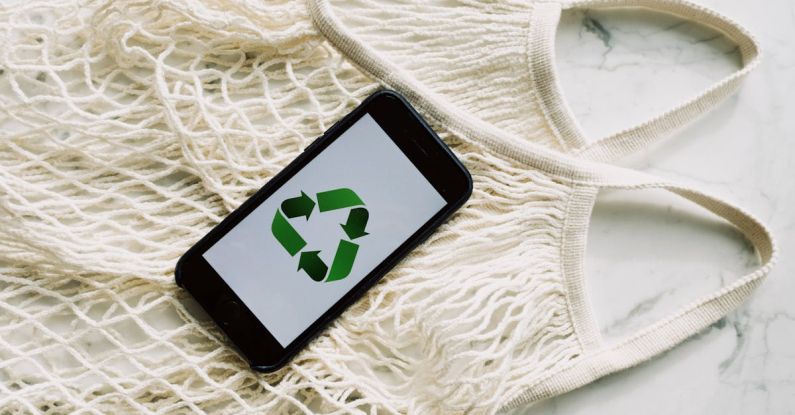 BIOS Screen - Eco friendly white mesh bag with smartphone placed on marble table