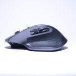 Ergonomic Mouse - black cordless computer mouse on white surface