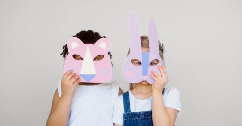 Innovative Design - Two Kids Covering Their Faces With a Cutout Animal Mask