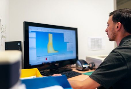 Monitoring Tools - man in black t-shirt sitting in front of computer