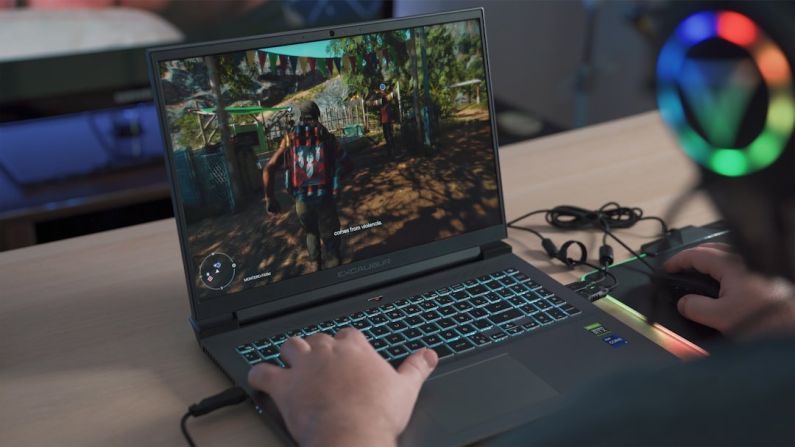 PC Lifespan - a person playing a video game on a laptop