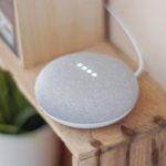 Smart Home - Round Grey Speaker On Brown Board