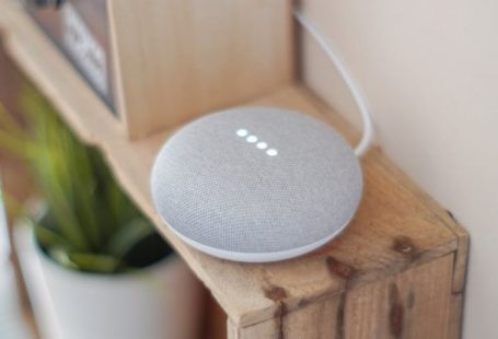 Smart Home - Round Grey Speaker On Brown Board